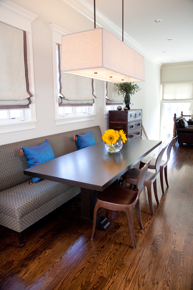 Dining room - transitional dark wood floor dining room idea in Chicago with white walls