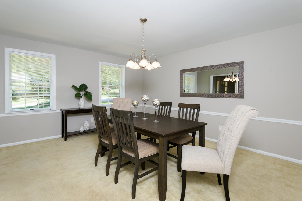 Dining room - mid-sized traditional carpeted and white floor dining room idea in Philadelphia with gray walls