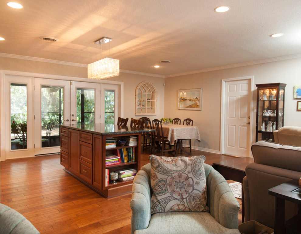 Example of a mid-sized transitional dark wood floor great room design in Tampa with white walls