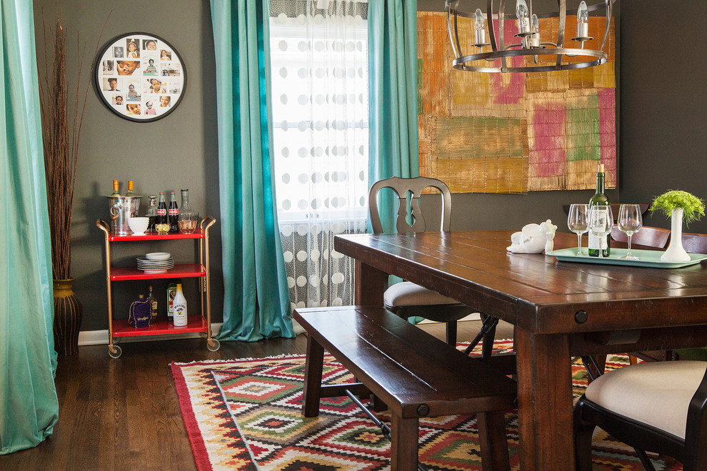 Design ideas for a bohemian dining room in Columbus with grey walls and dark hardwood flooring.