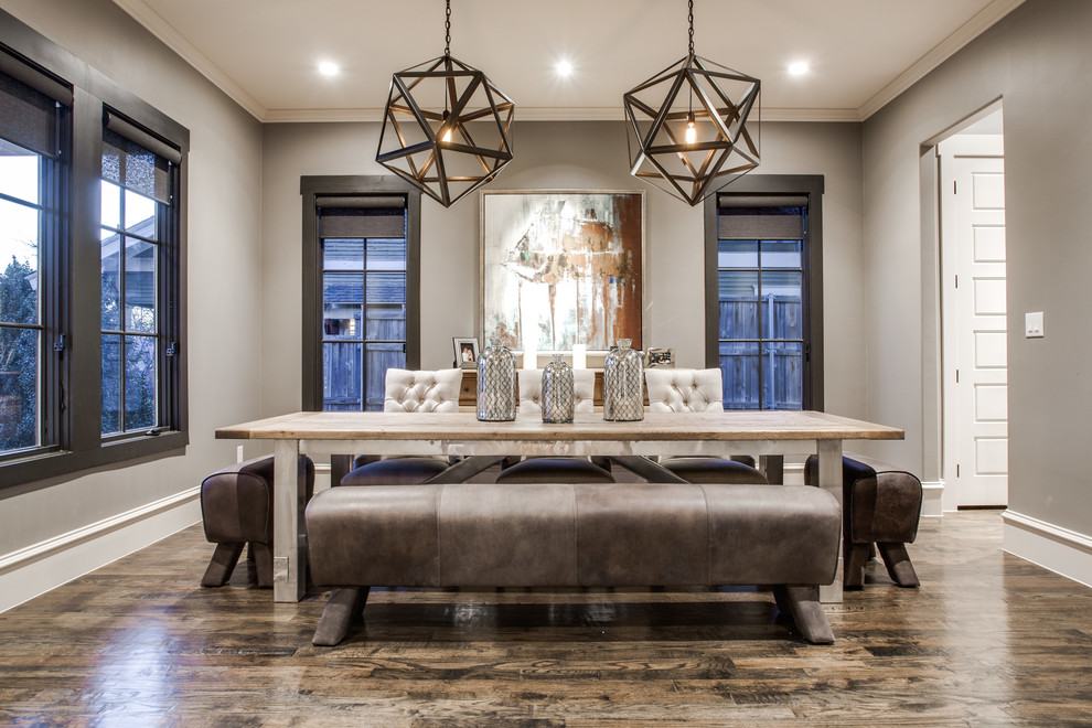 Classic dining room in Dallas with grey walls.