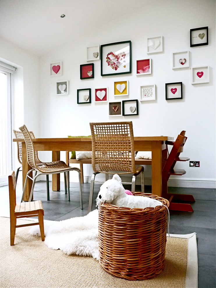 Inspiration for an eclectic slate floor dining room remodel in London