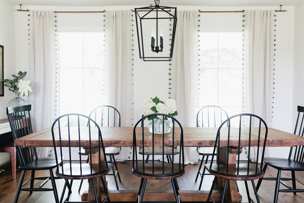 Enclosed dining room - large country dark wood floor and brown floor enclosed dining room idea in Dallas with white walls and no fireplace