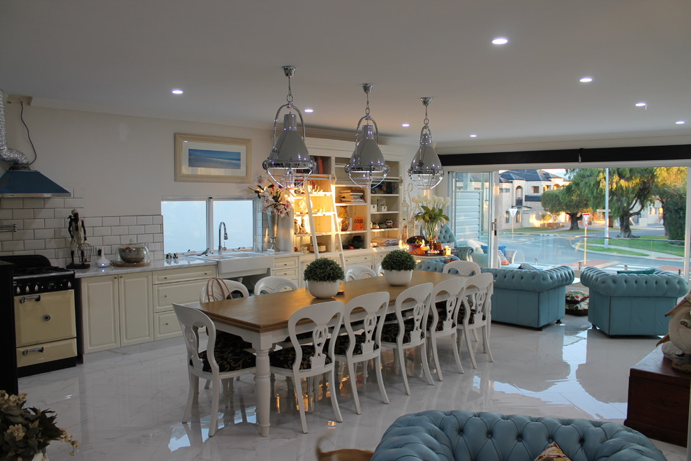 Design ideas for a large victorian open plan dining room in Perth with white walls, marble flooring and white floors.