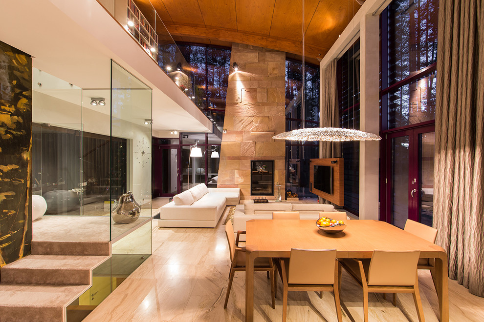 Esempio di una sala da pranzo aperta verso il soggiorno design di medie dimensioni con pavimento in marmo