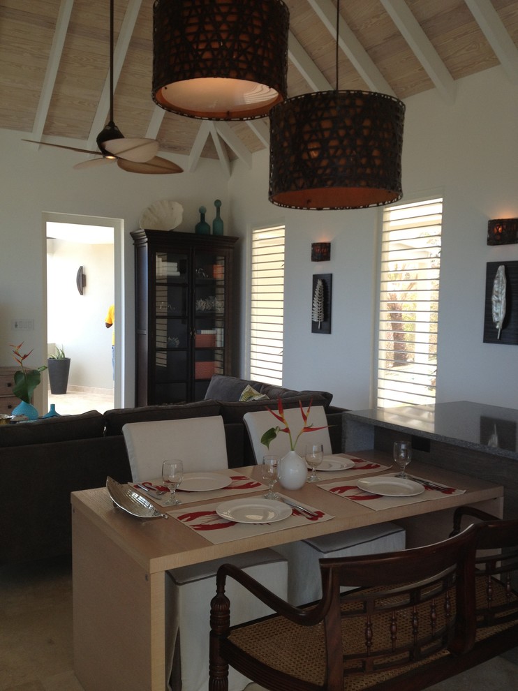 Example of an island style dining room design in Other