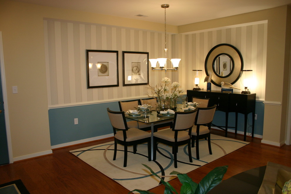 Inspiration for a timeless dark wood floor dining room remodel in Baltimore with beige walls