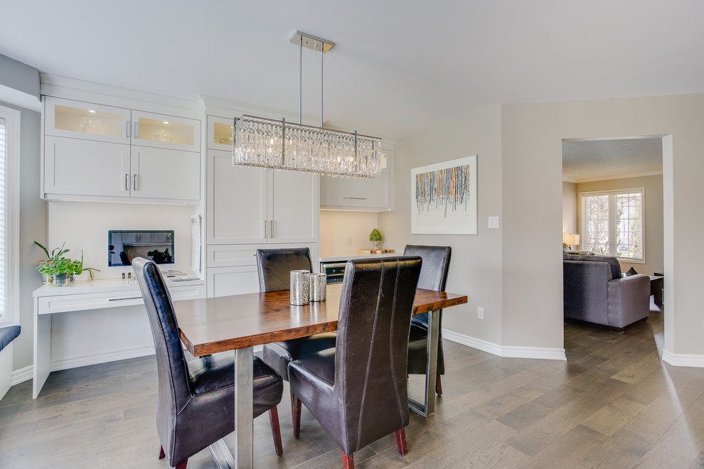 Photo of a large classic kitchen/dining room in Toronto with grey walls, dark hardwood flooring and brown floors.
