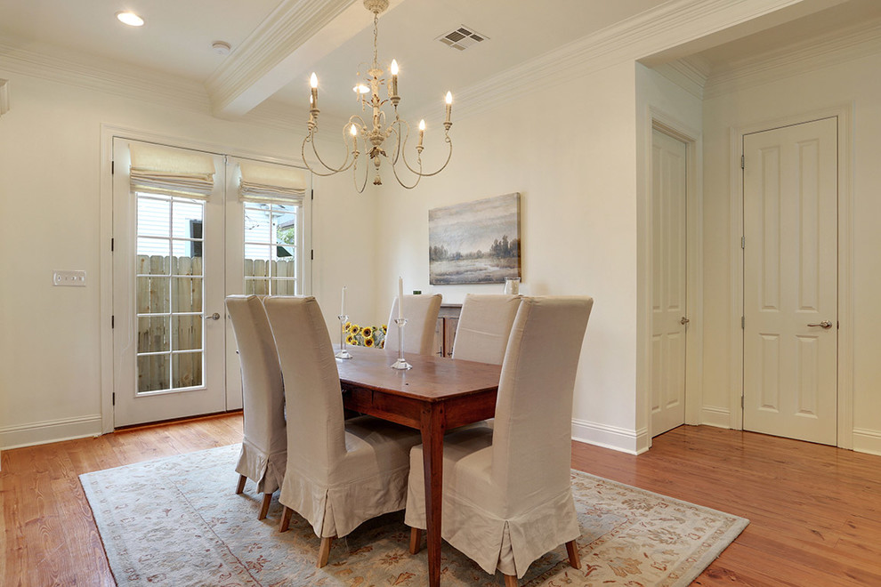 Elegant enclosed dining room photo in New Orleans