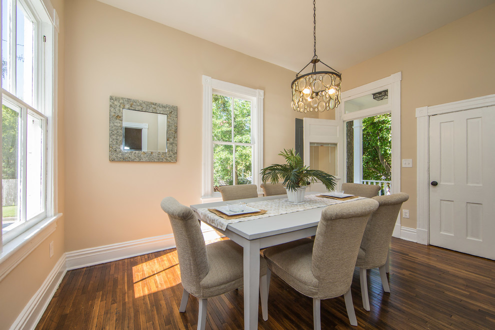 Photo of a medium sized traditional enclosed dining room in Richmond with brown walls, medium hardwood flooring, no fireplace and brown floors.