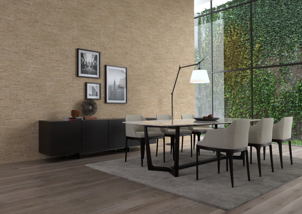 Photo of a modern dining room in Other with beige walls, cork flooring, brown floors and panelled walls.