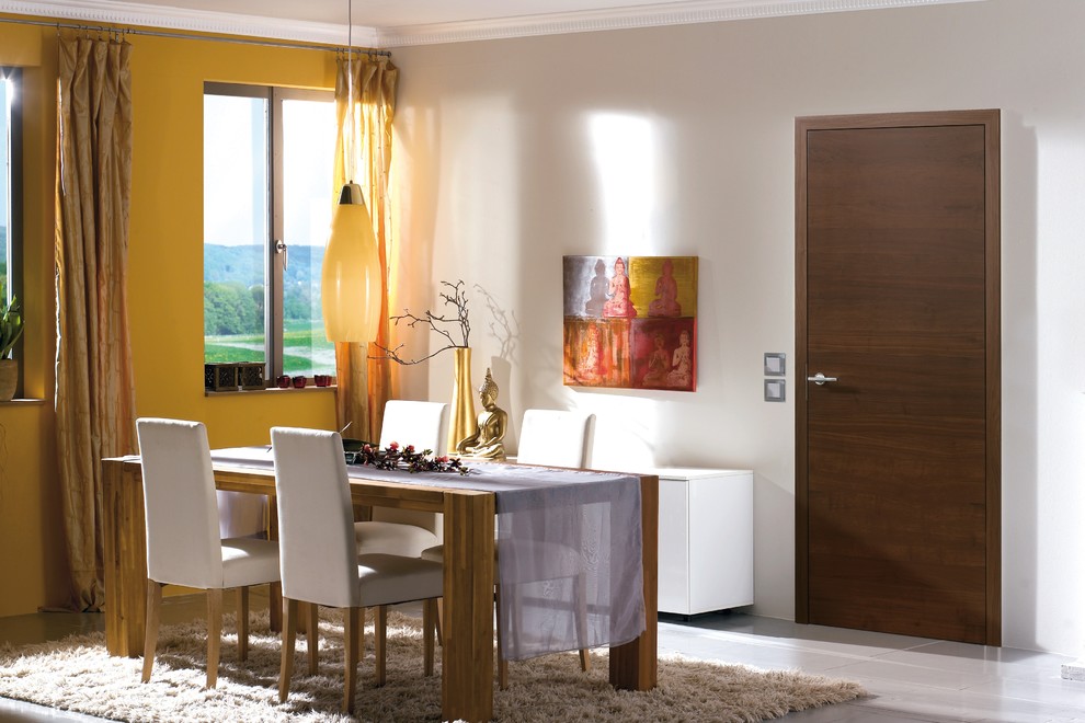 Example of a trendy dining room design in Hertfordshire