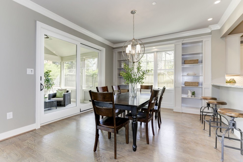 Inspiration for a mid-sized transitional light wood floor and brown floor kitchen/dining room combo remodel in Other with gray walls and no fireplace