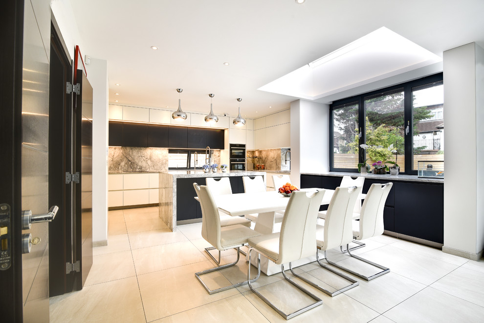 Photo of a contemporary kitchen/dining room in London with white walls, no fireplace and white floors.