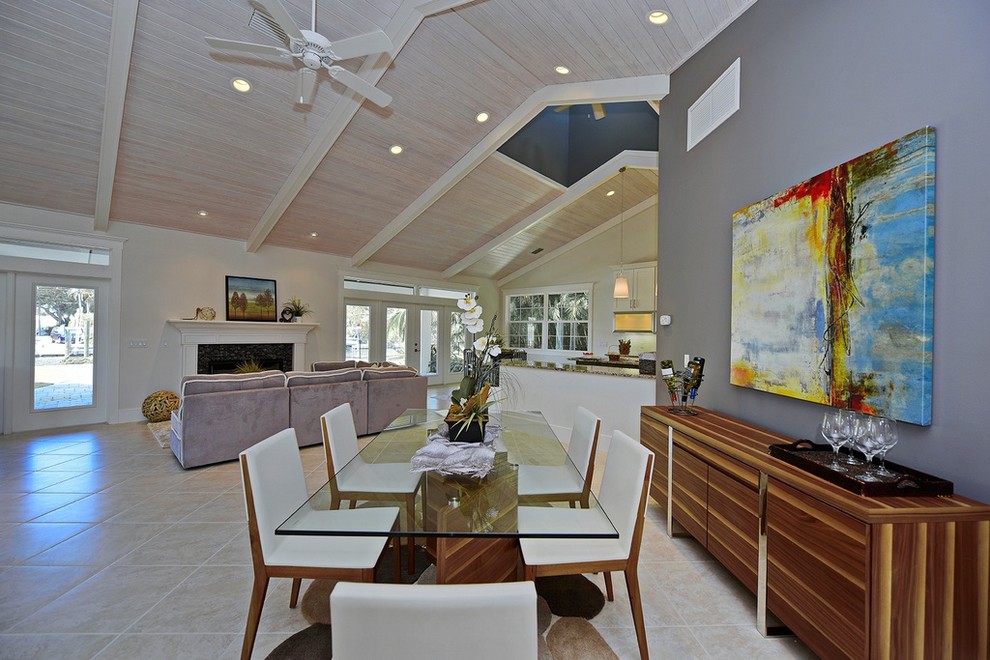 Example of a transitional dining room design in Tampa