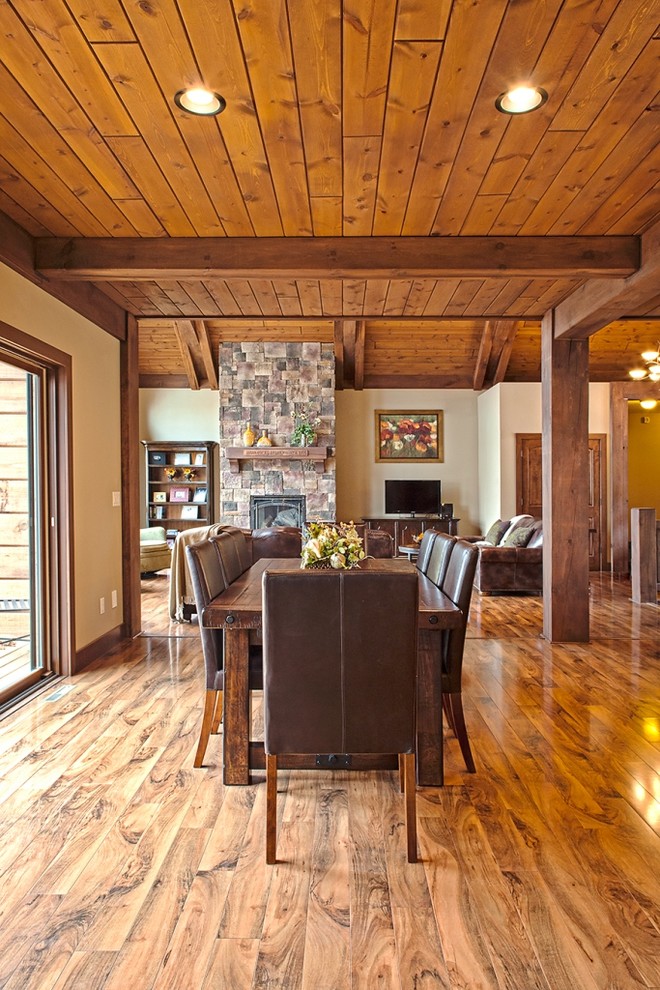 Design ideas for a rustic open plan dining room in Other with beige walls and medium hardwood flooring.