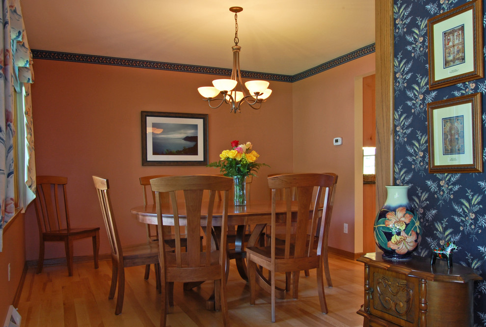 Transitional dining room photo in Milwaukee