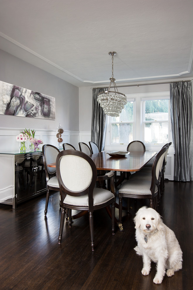 Mid-sized transitional dark wood floor dining room photo in Toronto with gray walls