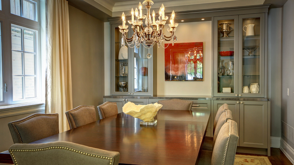 Inspiration for a timeless dark wood floor dining room remodel in Toronto with gray walls