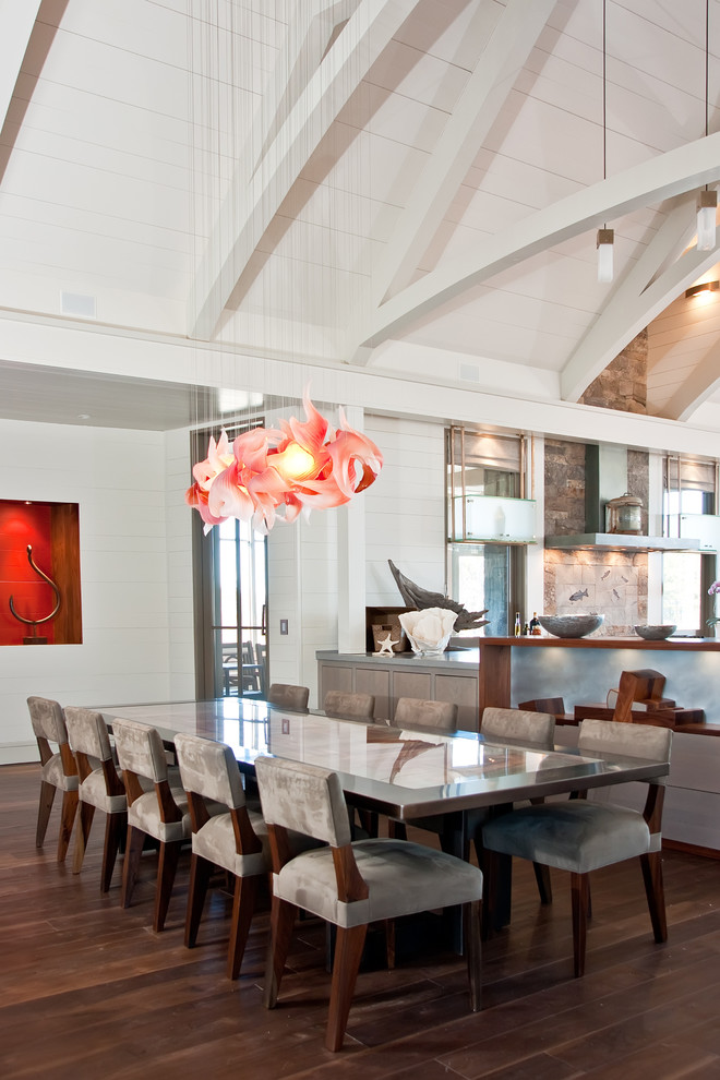 Large trendy dark wood floor and brown floor kitchen/dining room combo photo in Boston with white walls and no fireplace