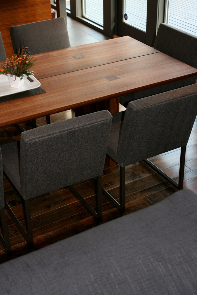 Example of a minimalist dining room design in Vancouver