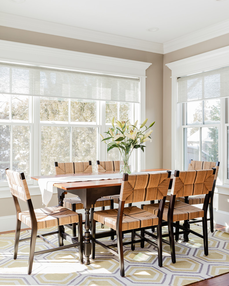 This is an example of a small traditional dining room in Boston with beige walls.