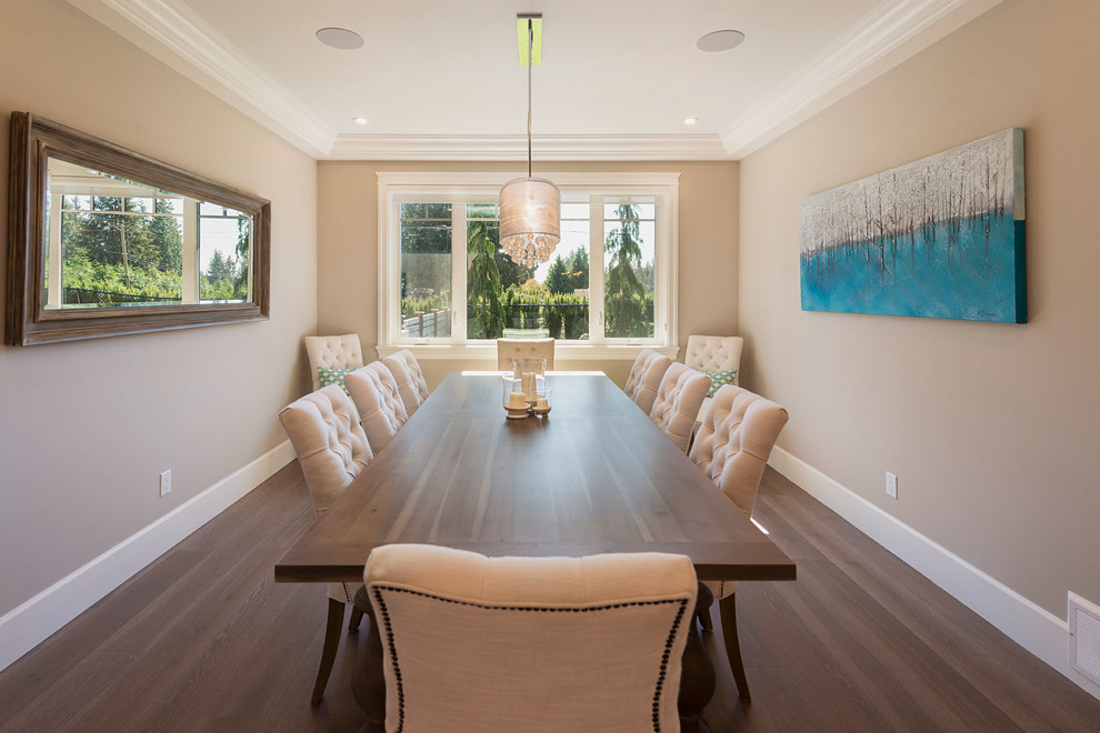 Design ideas for a large traditional enclosed dining room in Vancouver with beige walls, medium hardwood flooring, no fireplace and brown floors.
