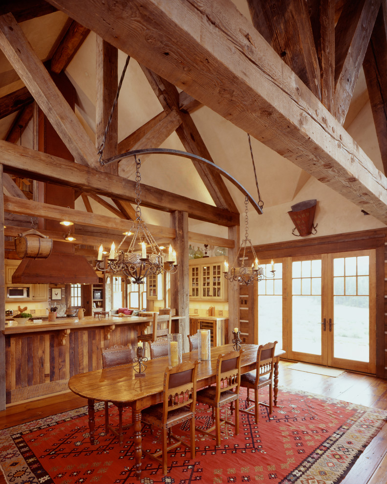 Inspiration for a rustic kitchen/dining room combo remodel in Denver with beige walls