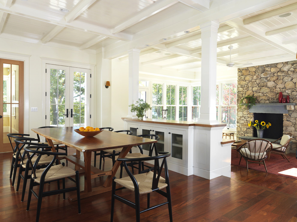 Design ideas for a traditional dining room in Providence with white walls and dark hardwood flooring.
