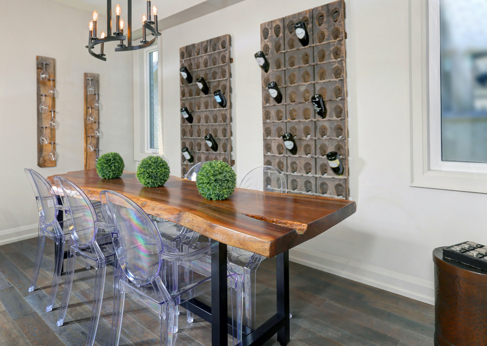 Traditional dining room in Toronto with grey walls and medium hardwood flooring.