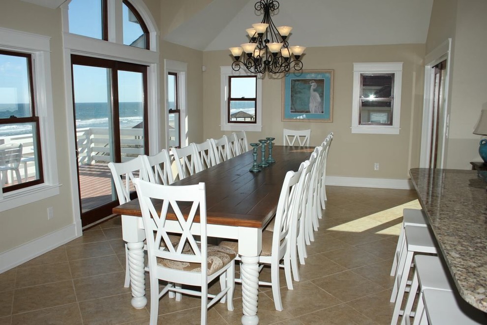This is an example of a medium sized beach style open plan dining room in Other with beige walls, ceramic flooring and no fireplace.