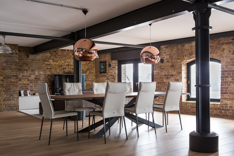 Inspiration for an industrial dining room remodel in London