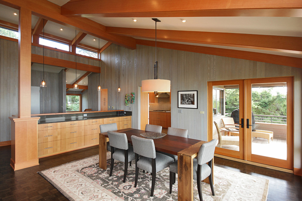 Inspiration for a large traditional open plan dining room in Seattle with grey walls, dark hardwood flooring and brown floors.
