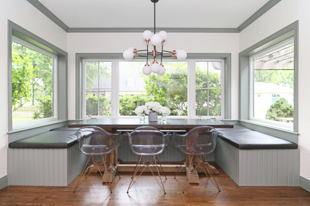 Inspiration for a mid-sized transitional medium tone wood floor and brown floor kitchen/dining room combo remodel in Other with white walls and no fireplace