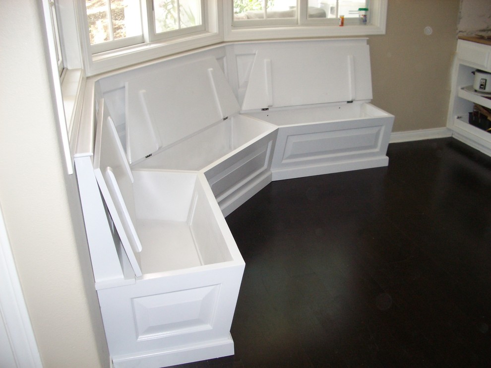 Example of a mid-sized classic dark wood floor kitchen/dining room combo design in Los Angeles with beige walls and no fireplace