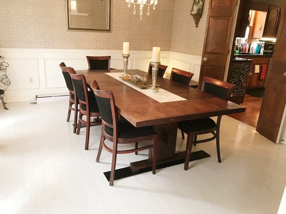Inspiration for a medium sized classic enclosed dining room with white walls, laminate floors and white floors.