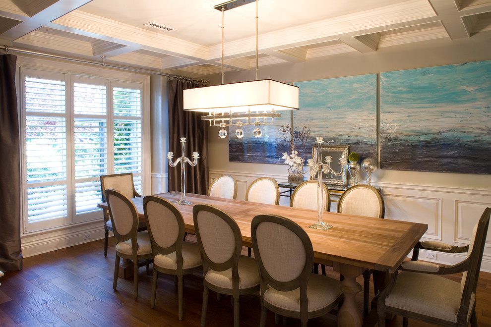 Enclosed dining room - large contemporary medium tone wood floor enclosed dining room idea in Vancouver with gray walls