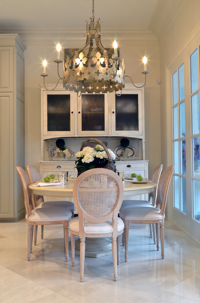 Example of a classic marble floor dining room design in New Orleans