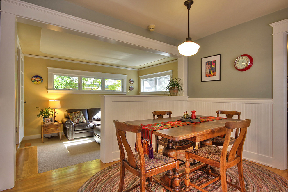 Mid-sized arts and crafts medium tone wood floor dining room photo in San Francisco with green walls