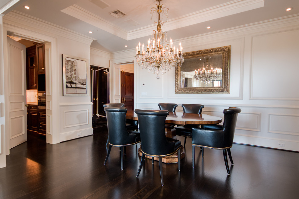 Inspiration for a large traditional open plan dining room in Orlando with dark hardwood flooring and no fireplace.