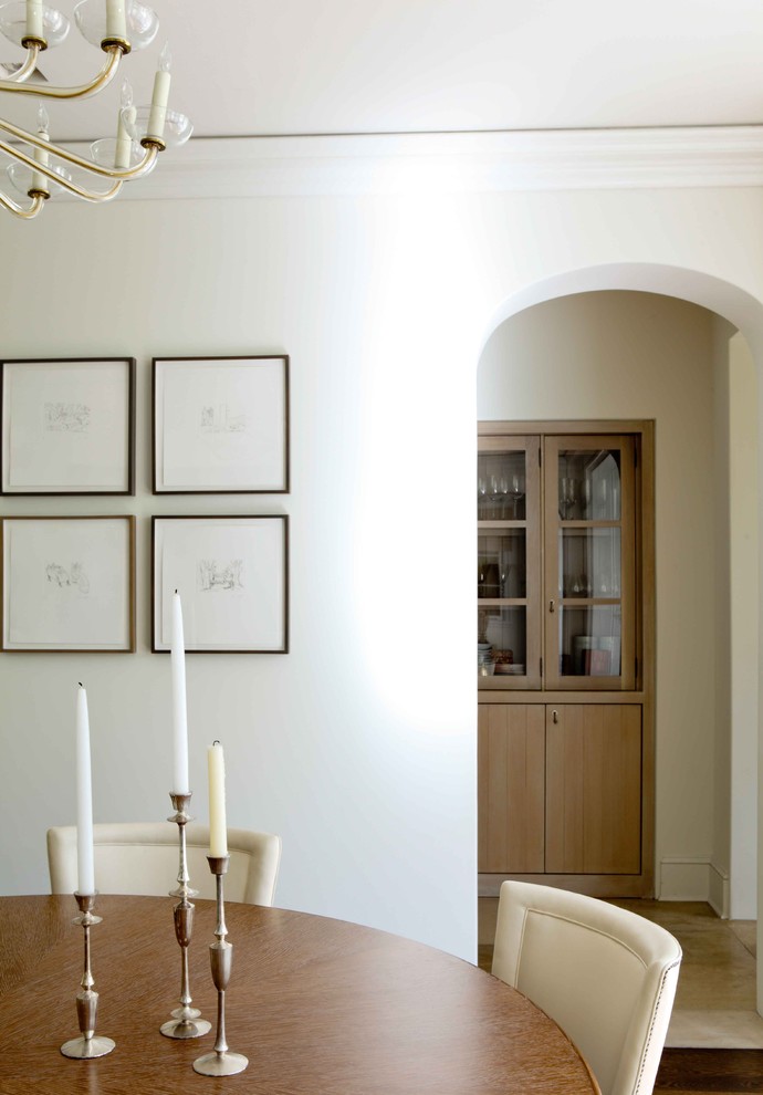 Transitional dining room photo in Los Angeles with white walls