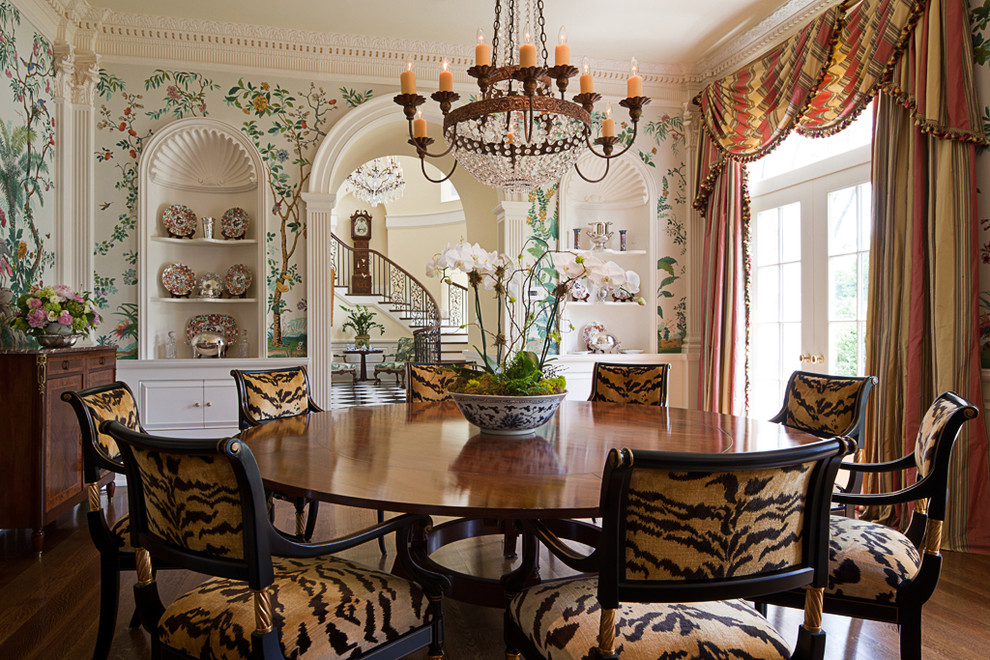 Photo of a traditional dining room in Atlanta with multi-coloured walls and dark hardwood flooring.