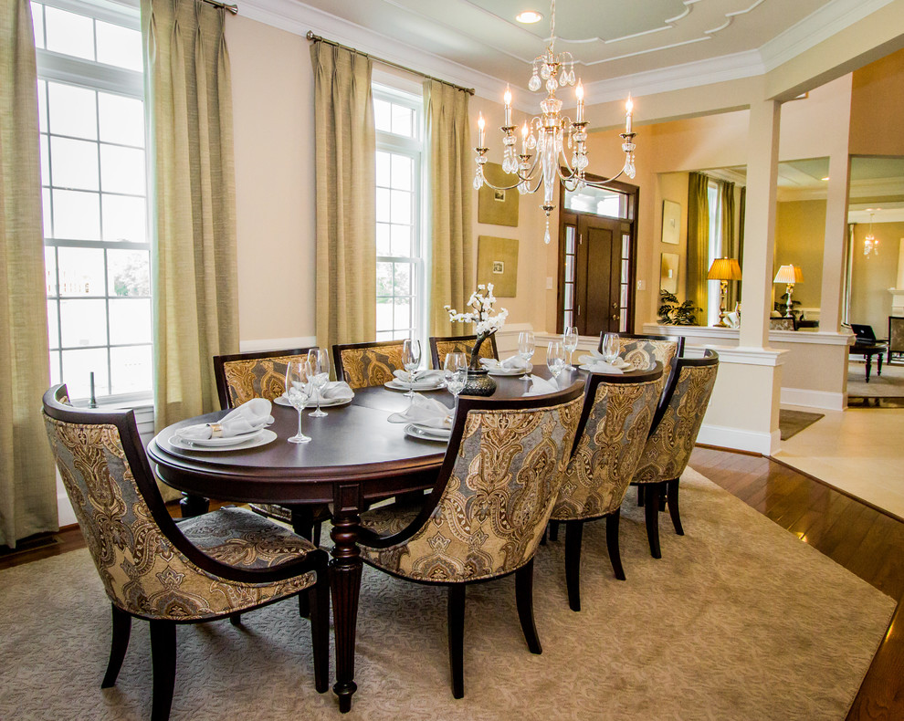 Large traditional enclosed dining room in Philadelphia with beige walls and dark hardwood flooring.