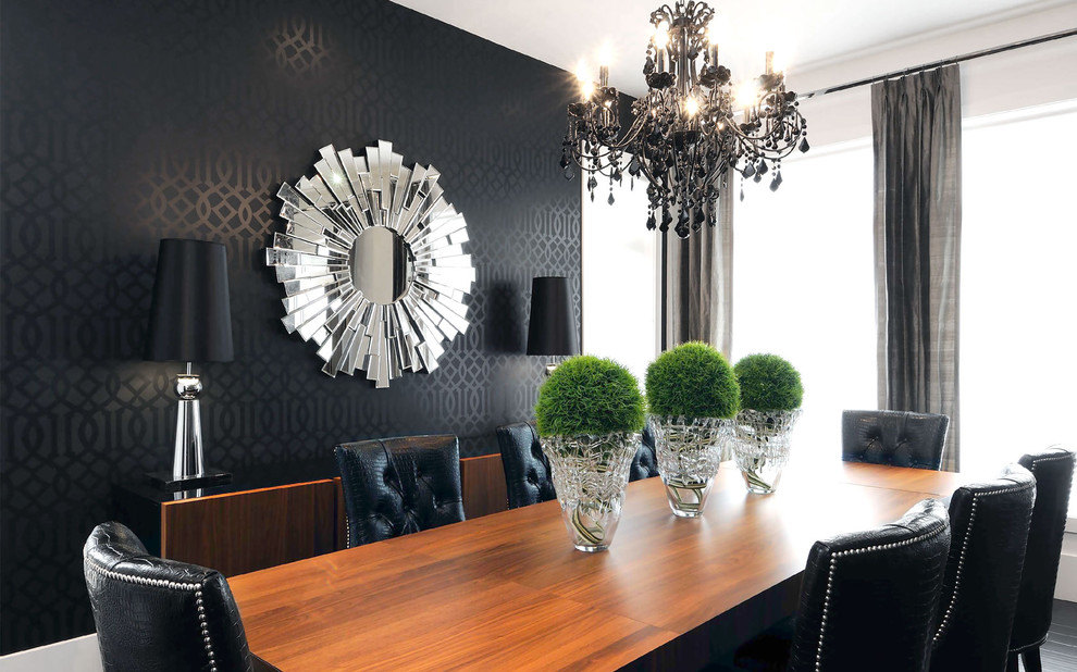 Dining room - contemporary dining room idea in Other with black walls