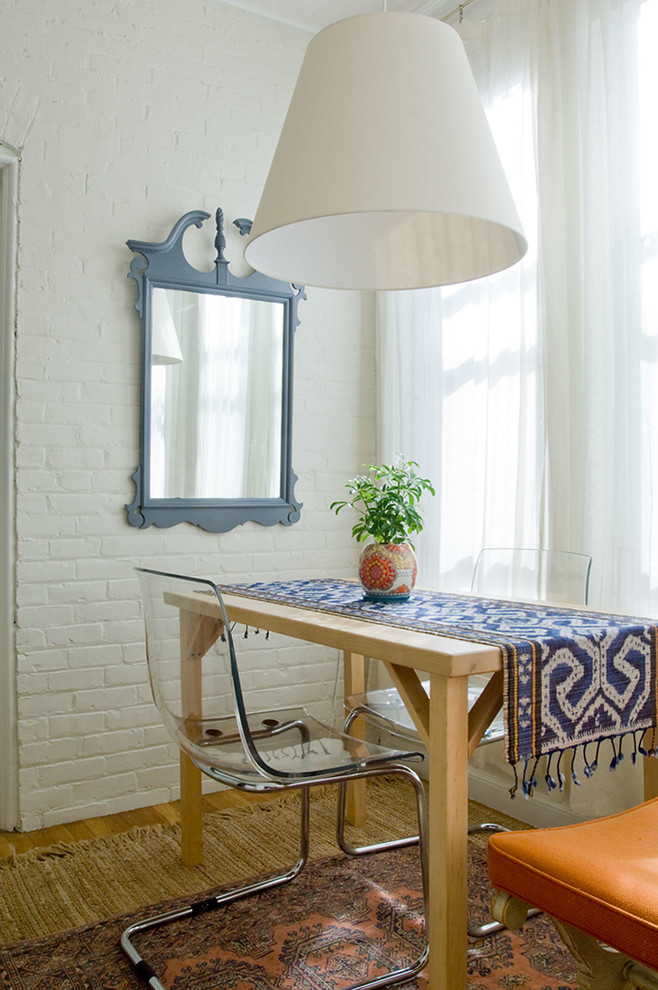 Photo of a scandinavian dining room in Boston.
