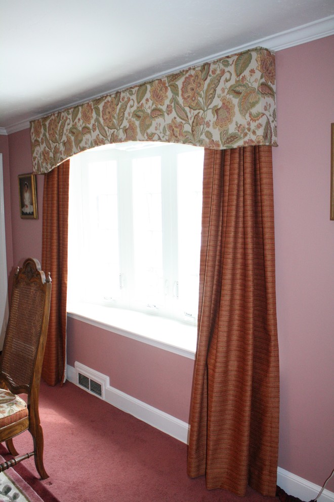Example of a large classic carpeted and pink floor enclosed dining room design in Boston with pink walls and no fireplace