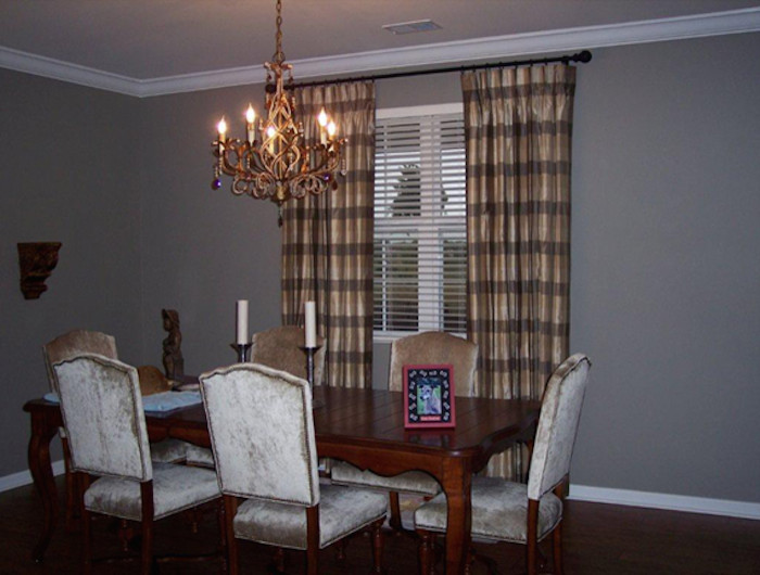 Medium sized classic enclosed dining room in Indianapolis with grey walls and dark hardwood flooring.