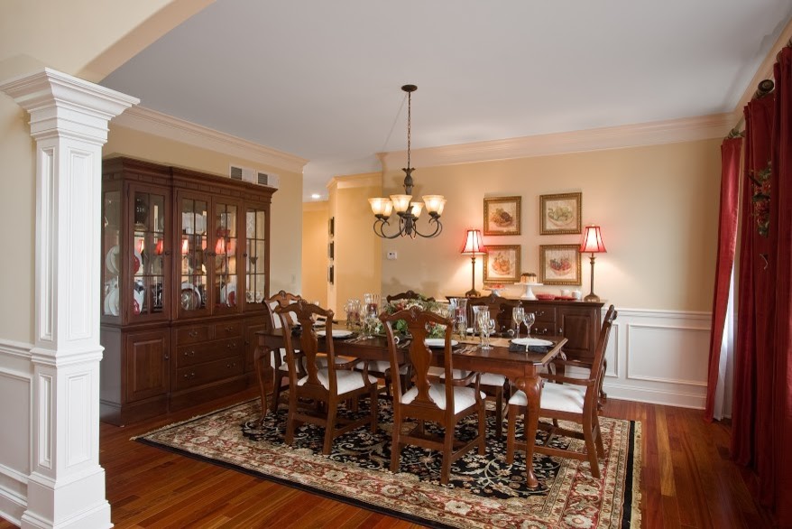 Inspiration for a large traditional enclosed dining room in Philadelphia with beige walls, medium hardwood flooring and no fireplace.