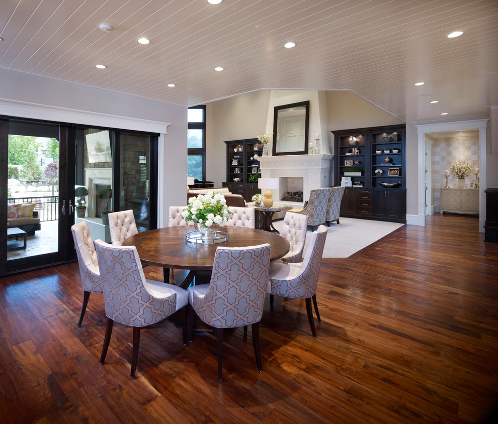 Inspiration for a large classic open plan dining room in Salt Lake City with grey walls, dark hardwood flooring, no fireplace and brown floors.