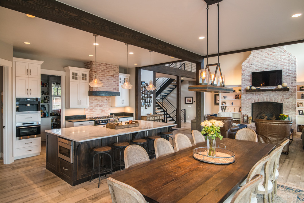 This is an example of a farmhouse dining room in Denver.